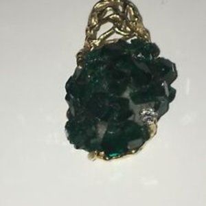 14k gold Pendant with emerald